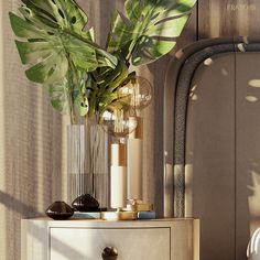 a plant in a vase sitting on top of a dresser next to a mirror and lamp