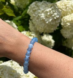 "High quality cornflower blue selenite beaded bracelet available in 8mm or 8.5mm width. Standard 7 inch size but can be customized slightly larger or smaller. Please note, this is natural white selenite but the beads have been colored. Selenite provides for clarity of the mind and clears mental confusion. It instils a deep sense of inner peace and calmness. Excellent for meditation and spiritual work. Purifies and cleanses one's aura. Can be used to form a protective band around oneself or ones Blue Moonstone Beaded Bracelets With Gemstone Beads, Blue Moonstone Beaded Bracelets Gift, Gift Blue Moonstone Beaded Bracelets, Blue Moonstone Bracelets For Healing, Spiritual Blue Moonstone Bracelets, Blue Moonstone Bracelet For Healing, Mental Confusion, Spiritual Work, Decision Making Skills