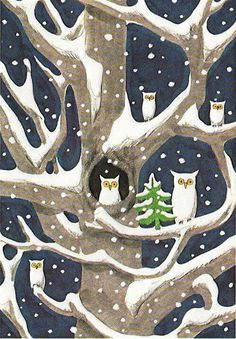 two owls are sitting in the middle of a snowy tree with an owl on it