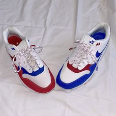 Nike Air Max. Leather/Suede. Red/White/Blue. Size 14. See All Pictures For Normal Wear And Tear. Some Discoloration Around The Red Suede. No Box. Nike White Suede Sneakers, White Suede Nike Sneakers, Sporty Red Nike Air Max Lace-up, White Suede Custom Sneakers, Casual Red Nike Air Max Lace-up, Casual Red Lace-up Nike Air Max, Nike Air Max Red Round Toe, Custom White Suede Sneakers For Sports, White Suede Custom Sneakers For Sports