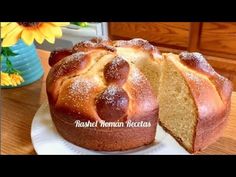 a bundt cake on a plate with one slice cut out