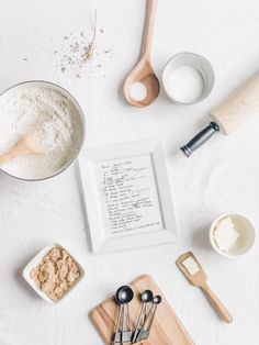 ingredients and utensils laid out on a white surface