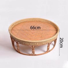 the measurements of a round wicker coffee table with rattan top and bottom edge