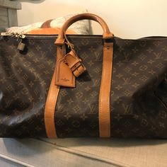 Louis Vuitton Malletier Carryall Luggage Duffel Bag. In Good Condition Considering It Is Over 30 Years Old. Very Clean. The Zipper Area Is Pulling Apart Slightly, That Is Where The Most Wear Is. Gold Hardware See Pictures. Brown Leather Trim Bag For Everyday Luxury, Luxury Brown Coated Canvas Luggage, Designer Brown Luggage With Leather Trim, Designer Brown Travel Bag, Designer Brown Coated Canvas Travel Bag, Brown Designer Coated Canvas Travel Bag, Designer Brown Luggage, Business Brown Monogram Canvas Luggage, Designer Travel Bag With Gold-tone Hardware