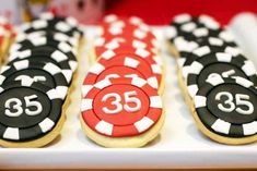 cookies decorated with casino chips and the number 35 are on display for guests to enjoy