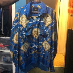 In Excellent Condition. Only Worn Once. 100% Authentic. Designer Blue Long Sleeve Top, Blue Long Sleeve Silk Top, Blue Silk Long Sleeve Top, Designer Printed Blue Tops, Designer Blue Printed Tops, Luxury Blue Long Sleeve Shirt, Luxury Long Sleeve Blue Shirt, Fitted Silk Blue Shirt, Luxury Blue Silk Top