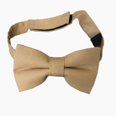 100% brand new and high quality  Material: Linen * Dimensions of kids Bow tie- --Approx. 9CM length of bow tie;Height of bow tie 5cm; strap width 1.8cm *Adult Bow tie Size: Approx. 12CM length of bow tie;Height of bow tie 6cm Color: Champagne Wash Care: Dry Clean Only Note: Due to manual measurement , there may be 1-2cm deviation exist,hope you can understand.  There are slight difference between the picture and the real item caused by light brightness,hope you can understand. S H I P PING: Prod Adjustable Satin Bow Tie For Business, Adjustable Satin Bow Tie In Dapper Style, Dapper Adjustable Satin Bow Tie, Dapper Adjustable Tie With Satin Bow, Adjustable Bow Tie For Dapper Style, Adjustable Dapper Ties With Bow Tie Back, Brown Summer Bow Tie, Classic Adjustable Bow Tie With Ribbon, Dapper Adjustable Bow Tie For Father's Day