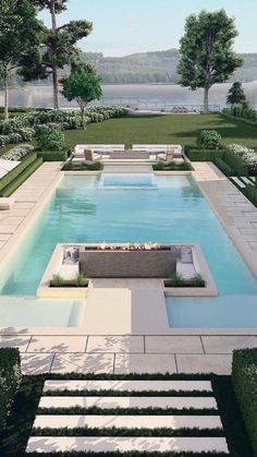 an outdoor swimming pool with steps leading to it and trees in the backgroud