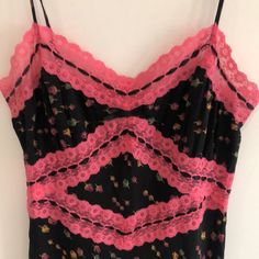 This Silk Slip Dress Has Adjustable Spaghetti Straps With A Pink Lace & Ribbon Detail Around The Neckline And Bust, Waist And Trim. There Is One Area That Needs A Stitch Or Two (See Picture). The Seam Is Slightly Open. Otherwise The Dress Is Perfect. Please Note This Is Not A New Betsey Johnson Dress/Style. This Is The Original Launched Years Ago. This Dress Is At Least 20 Years Old And Was Purchased At A Betsey Boutique In Nj Or Nyci Used To Shop At Both. Spring Pink Cami Mini Dress, Pink Spaghetti Strap Y2k Dress, Pink Y2k Dress With Spaghetti Straps, Pink Y2k Style Dress With Spaghetti Straps, Pink Mini Slip Dress With Lace Trim, Pink Lace Trim Mini Slip Dress, Pink Floral Print Slip Dress With Spaghetti Straps, Pink Floral Print Slip Dress, Pink Slip Dress For Spring Night Out