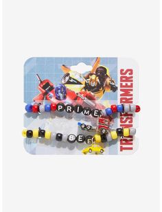 two bracelets with cars and trucks on them, one is for children to wear