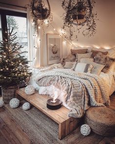 a bedroom decorated for christmas with lights and decorations