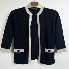 Vintage Chanel Uniform 1980s Wool Knit Cardigan Black Size 40 Honestly Such A Beautiful Rare Piece 100% Authentic Price Goes From $950/$1900 Online Super Collectible Needs A New Home It’s Time For Me To Rotate To Something New. #Chanel #Cardigan #Vintage Chanel Cardigan, Chanel Sweater, Cardigan Vintage, Cardigan Black, Wool Knit, Vintage Chanel, Black Cardigan, Knit Cardigan, New Home