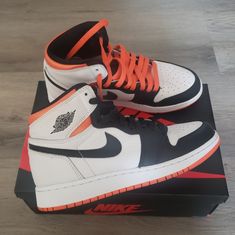 Excellent Pre-Owned Condition. No Major Signs Of Wear. No Stains, Rips Or Tears. See Pictures For More Visual Details. Two Sets Of Shoelaces: Black And Orange. Shoes Come With Original Shoe Box. Orange Jordan Shoes With Cushioned Footbed, Orange And White Jordans, Black And Orange Nike Shoes, Air Jordan 1 Mid Orange Black, Orange Low-top Jordan Shoes With Cushioned Footbed, Kids Jordans, Jordan 1 Retro High, Kids Sneakers, Sneaker Collection