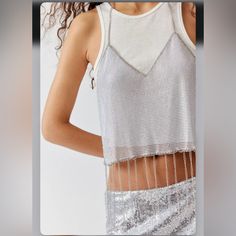 Urban Outfitters Rae Metal Fringe Halter Top Trendy Silver Tops For Summer, Urban Outfitters Tank Top For Summer Nights Out, Urban Outfitters Tank Top For Night Out In Summer, Urban Outfitters Sleeveless Tank Top For Party, Urban Outfitters Tank Top For Summer Party, Urban Outfitters Summer Party Tops, Urban Outfitters Tops For Summer Festivals, Urban Outfitters Summer Festival Tops, Fringe Halter Top