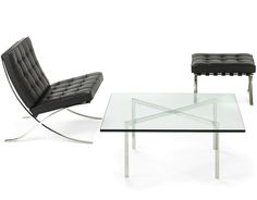 a glass table with two chairs next to it on a white floor and an ottoman