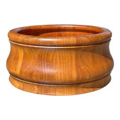 a wooden bowl is shown on a white background