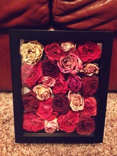 a black frame with red and yellow flowers in it that says how to save a significant bouquet of flowers