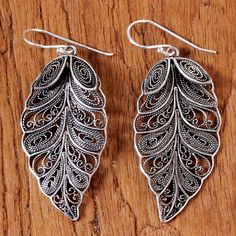 NOVICA - Feathered Leaves Sterling Silver Dangle Earrings Metal Filigree Dangle Earrings, Silver Leaf-shaped Handmade Earrings, Sterling Silver Leaf-shaped Earrings, Artisan Silver Filigree Earrings, Bohemian Leaf-shaped Metal Earrings, Paw Print Jewelry, Ribbon Jewelry, Filigree Jewelry, Filigree Earrings