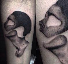 two black and white tattoos on the legs of people with their faces in different shapes