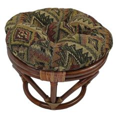 a wooden stool with a colorful cushion on it