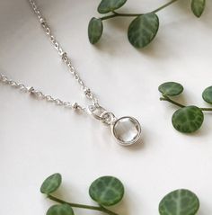 This clear quartz necklace is so dainty and light. June birthstone. A small faceted gemstone pendant is set in sterling silver.  The perfect crystal jewelry for everyday wear.  If you want to add more charms to your necklace, please contact me. More gemstones available here: https://www.etsy.com/ca/shop/annielesperance?ref=seller-platform-mcnav&section_id=6733458 * SIZE: 6mm stone * LENGTH: 18 inches (16 inches on demand) * MATERIAL: Sterling silver, faceted gemstone Clear Quartz Necklace, June Birthstone, Necklace Dainty, June Birth Stone, Quartz Necklace, Faceted Gemstones, Birthstone Necklace, Clear Quartz, Gemstone Pendant