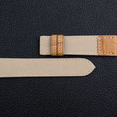 Beige Canvas mix Alligator Watch Strap 100% handmade custom straps by Vietnamese craftsmen  Structure of a set of Canvas mix Alligator watch band: Sailcloth mix Alligator Leather main face, water-resistant and soft Zermatt specialized lining, absolute anti-irritant, Velodon specialized reinforced material (SH-220 reinforcement).  The HANDDN strap will come FREE with a tang buckle / Quick release spring bar. Please leave a note if you want to use your own buckle/clasp.   	Color: Beige   	Style: C Canvas Watch Strap, Casio Watch Leather Strap, Brown Rectangular Wrist Strap For Watches, Rolex Gmt Leather Strap, Brown Rectangular Watch Strap, Custom Strap, Beige Style, Sailing Outfit, Quick Release