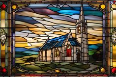 a stained glass window with a church in the background