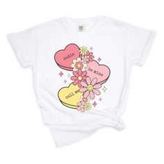 Looking for a cute versatile top to wear this summer? Make sure to grab one of our Retro Valentine Hearts garment dyed graphic tees! This soft and comfortable graphic tee is the perfect top for any outfit. It can be paiWhite with biker shorts, jeans, or even a simple skirt/dress! This tee is true-to-size, so be sure to order your regular t-shirt size! If you are looking for a more oversized look, make sure to size up! Casual Heart Graphic T-shirt For Spring, Casual T-shirt With Heart Graphic For Spring, Spring Graphic Tee With Heart Design, Cute Heart Graphic Tops For Summer, Cute Summer Tops With Heart Graphic, Spring Cotton T-shirt With Heart Graphic, Cute Tops With Heart Graphic For Spring, Playful Heart Graphic Tops For Spring, Fun Heart Graphic Tops For Summer