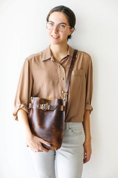 Handmade Leather Bag | Vintage Leather Backpack Rectangular Bucket Bag With Brass Hardware, On-the-go Satchel Shoulder Bag With Brass Hardware, Brown Satchel With Brass Hardware For Everyday Use, Chic Leather Backpack With Leather Lining, Chic Leather Backpack With Satchel Design, Chic Everyday Shoulder Bag In Vegetable Tanned Leather, Chic Everyday Vegetable Tanned Leather Shoulder Bag, Leather Bucket Shoulder Bag With Brass Hardware, Leather Satchel With Brass Hardware For Everyday