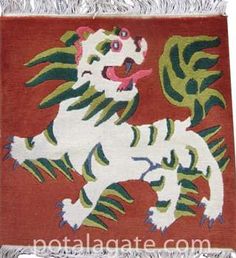 a white tiger rug with fringes on it's sides and an orange background