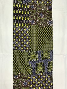 This black and gold African Fabric is high quality African print made from 100% cotton and it's 45 inches wide. It is used for making African Clothing, African quilts, & For Home decoration. FYI: Print is Double sided. The listing is for 1, 6 yards and Headwrap Each piece of fabric measures: 36in by 45in for 1 yard 216in by 45in for 6 yards 70in by 22in for Head wrap If you purchase more than one yard, you will receive one continuous piece. *If you require more than what I have listed, feel African Quilts, Clean And Press, African Prints, Ankara Fabric, Tiger Stripes, Wax Print, African Fabric, Head Wrap, African Clothing