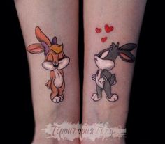 two tattoos on the legs of people with bunny and rabbit ears tattooed to them, one is holding a cat