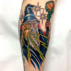 a man with a wizard hat and wand on his arm is shown in an instagramtion