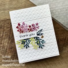 a thank card with flowers on it