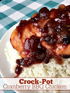 crock pot cranberry bbq chicken on white rice with blue and white checkered tablecloth