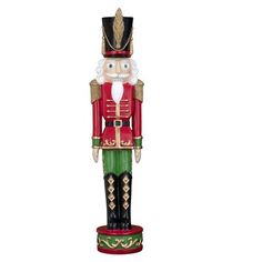 a christmas nutcracker statue is shown on a white background