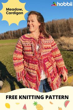 a woman standing in a field wearing a pink and orange shawl with text overlay that reads free knitting pattern meadow, cardigan