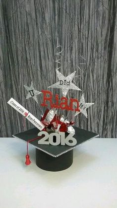 the graduation cap is decorated with stars and ribbons