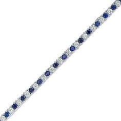 Dainty and dazzling, this tennis bracelet increases the sparkle factor of any attire. Crafted in sterling silver, this simply glistening style showcases alternating 2.0mm lab-created bright blue and shimmering white sapphires. Buffed to a brilliant luster, this 7.25-inch bracelet secures with a box clasp. Sapphire Tennis Bracelet With Round Diamonds, Sapphire Diamond Tennis Bracelet With Round Shape, Sapphire Diamond Tennis Bracelet With Round Cut, Sapphire Brilliant Cut Tennis Bracelet, Sapphire Diamond Tennis Bracelet, Sapphire Color Brilliant-cut Cubic Zirconia Bracelets, Sapphire Tennis Bracelet Fine Jewelry With Prong Setting, Classic Blue Diamond Bracelet In Sterling Silver, Classic Sapphire Tennis Bracelet With Prong Setting