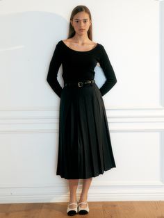 Editor's NotesThis product is a long pleated skirt made from a sturdy fabric that gracefully holds its shape. It features a high-waist design that creates a flattering line, and the precise pleats allow for a neat and straightforward fit. The silhouette falls in line with the body, and the skirt's belt loops are strategically placed at the end of the waistline, ensuring a secure and composed look when paired with a belt.- The robust material of this long pleated skirt ensures a structured and elegant drape.- Its high-waisted design and neat pleating contribute to a polished and refined appearance.- The skirt's design accommodates a belt for a snug fit, adding both function and a touch of style.Measurements(in.)Size: Size (S/M/L)- Waist Width: 13.39/14.17/14.96- Hip Width: 19.29/20.08/20.87 Classic Skirted Bottoms With Pleated Waist, Fitted Midi Pleated Skirt, Elegant Fitted Pleated Skirt For Fall, Pleated Fitted Maxi Skirt For Work, Elegant Pleated Skirt For Fall, Elegant Full Skirt Bottoms For Fall, Classic Fitted Skirt With Pleated Hem, Fitted Midi Skirt With Pleated Waist, Elegant Box Pleat Bottoms For Fall