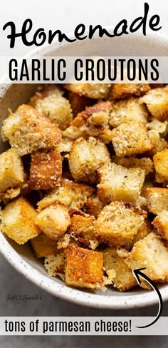 homemade garlic croutons in a white bowl with text overlay that reads homemade garlic croutons tons of parmesan cheese