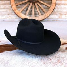 Your little cowboy or cowgirl will look all grown up mutton bustin' in this Youth Resistol Crossroads Jr. Black Felt Cowboy Hat. This Black Crossroads Jr. is made from durable, premium wool, with an elastic sweatband to ensure a snug fit. This hat also features a regular oval, cattleman creased 4-1/4" crown, and black ribbon hat band.Resistol has become the greatest name in western hats. Resistol hats are known for their high quality and long wear, in both felt hats and straw. Felt,Fur One Size Black Flat Bill Hat For Ranch, Flat Bill Black Hat For Rodeo, Black Western Hat Bands With Flat Bill, Black Flat Bill Hats For Country Events, Black Flat Bill Felt Hat For Country Events, Black Curved Brim Hat Bands For Ranch, Black Felt Hat With Flat Crown For Ranch, Black Flat Bill Felt Hat For Outdoor, Black Flat Bill Felt Hat For Outdoors