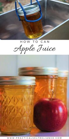 jars filled with apple juice sitting on top of a metal sink next to an apple