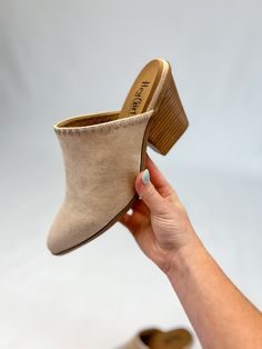 Step out in style with [Corky's] Sizzle Mule-Sand Faux Suede! These elegant heeled mules feature a cushioned footbed for all-day comfort, a pointed toe for a sophisticated touch, and embroidered details for added elegance. The light, neutral hue makes them perfect for any occasion. Key Features: Sand Faux Suede 3 inch Heel Slide on mule Corkys does not make half sizes, so if you are in between sizes, we recommend sizing up to the next whole size in order to ensure a proper fit. 3 Inch Heels, Embroidered Details, Slide On, Mules Shoes, The Light, Mule, Heeled Mules, Faux Suede, In Style