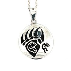 Vintage Hope Bear Paw Kokopelli Overlay Sterling Silver Pendant - Expertly crafted with intricate overlay metalwork, this traditional Hopi Pendant features a Bear Paw and dancing kokopelli. A perfect piece to add it to your collection of stunning Native American jewelry. Setting: 1.5" Dia Size: 2"L w/bail Metal: Sterling Silver Weight: 15.3 Grams Includes 16" SS Rolo Chain This listing is for (1) Pendant only Explore our curated selection of Vintage Pendants + Necklaces here. Discover the entire 'Silver Raven' Vintage Collection for yourself. Bear Claw Necklace Native American, Old Pawn Native American Jewelry, Philip Sekaquaptewa Hopi Jewelry, Beaded Bear Medallion, Bear Pendant Necklace, Raven Jewelry, Vintage Pendant Necklace, Bear Paw, Pendants Necklaces