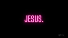 the word jesus is lit up in pink on a black background with an inscription below it