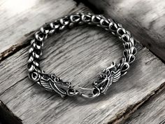 🐉 Embrace the power of the Chinese zodiac with this striking 925 sterling silver bracelet featuring intricate dragon scale patterns! This thick, bold bracelet is perfect for men looking to add a touch of luck and style to their party outfits 🎉. Made from high-quality sterling silver, it's a timeless piece that reflects strength and fortune. A great gift or an eye-catching addition to your jewelry collection! 💫 📏 Material: S925 Sterling Silver 🔥 Style: Bold, thick design 🌟 Perfect for: Part Dragon Scale Bracelet, Zodiac Designs, Party Kleidung, Dragon Scale, Silver Dragon, Bracelet For Men, Silver Style, Chinese Zodiac, Party Outfits