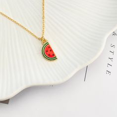 🍉 Add a Splash of Summer to Your Style! 🍉 Elevate your accessory game with this adorable Watermelon Charm Necklace! Perfect for those sunny days, this gold-plated pendant is a sweet nod to your love for all things summer. Whether you're hitting the beach or just want to bring a bit of sunshine to your outfit, this fun fruit necklace is the perfect choice. Crafted with attention to detail, the watermelon charm features vibrant colors that pop against the golden chain, making it a standout piece Fruit Necklace, Fun Fruit, Sweet Accessories, Chain Making, Necklace Cute, Golden Chain, Pendant For Women, Fun Summer, Summer Jewelry