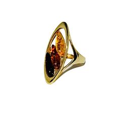 Spectacular ring handcrafted of sterling silver covered 14ct. gold and natural Baltic amber.Cherry, cognac and  lemon amber stones fitted in gold setting.This fabulous jewellery suitable for everyday and evening wear. Amber stone created by nature over 25 millions years ego, amber attracts good luck, balances emotions, dissolves negative energy. Care Instructions: To maintain your jewellery, wipe gently with a cotton cloth that is soft and clean. Do not soak in water. Avoid contact with soaps, d Amber Ring Gold, Amber Ring, Natural Amber, Amber Stone, Amber Jewelry, Fabulous Jewelry, A Plus, Baltic Amber, Ring Gold