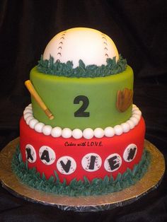 a cake that is decorated to look like a baseball field and number two on it